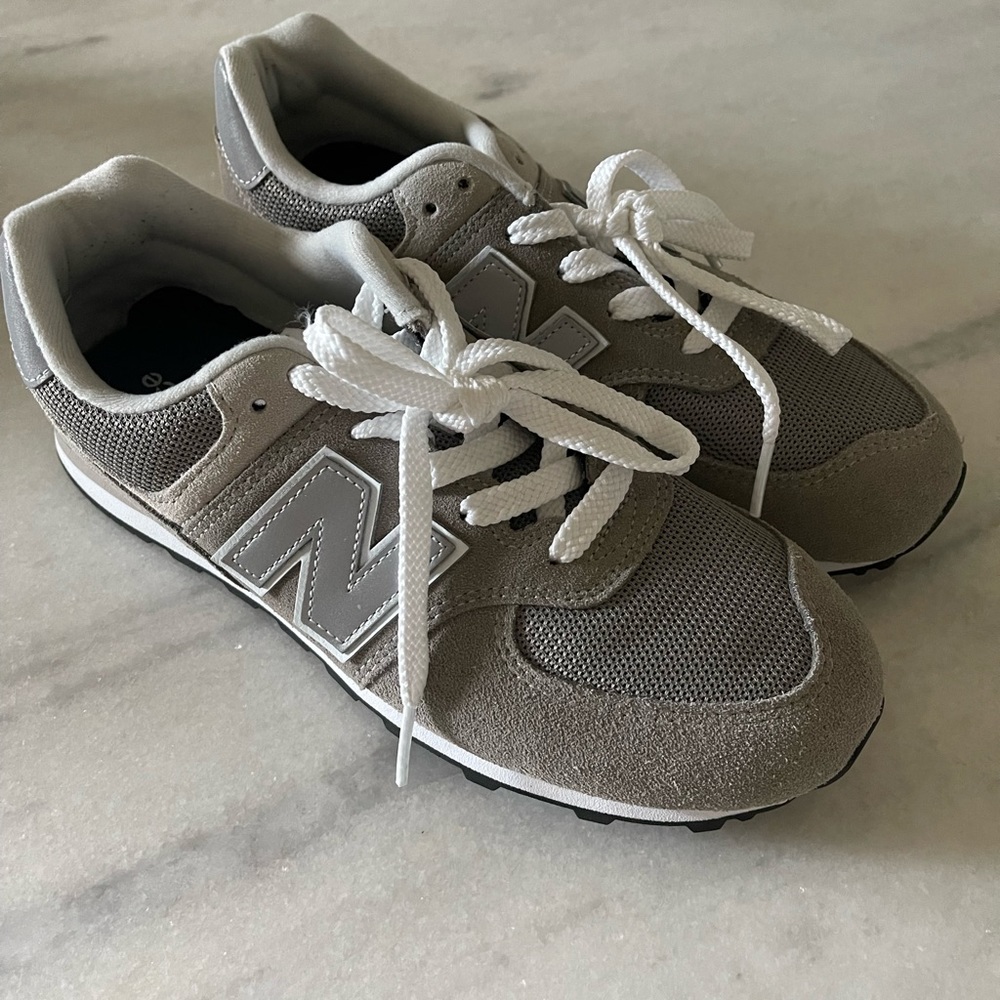Unisex New Balance 574 Gray with white trim (never worn, run big)